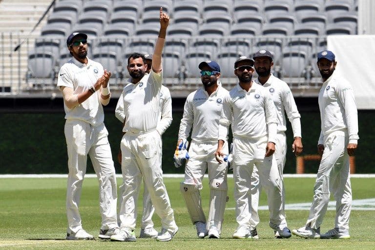 1st Test: India 15/2 at lunch after Australia wag to 243