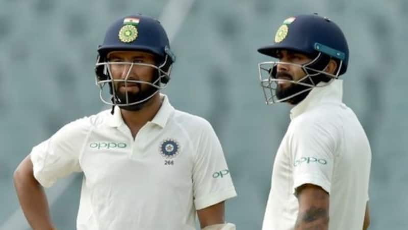 Cheteshwar Pujara and Virat Kohli