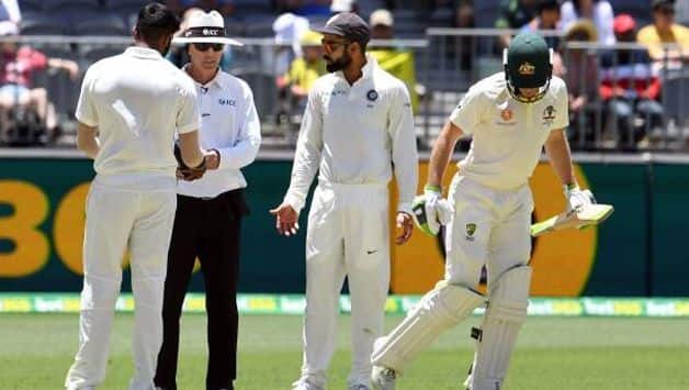 Virat Kohli and Tim Paine @ AFP