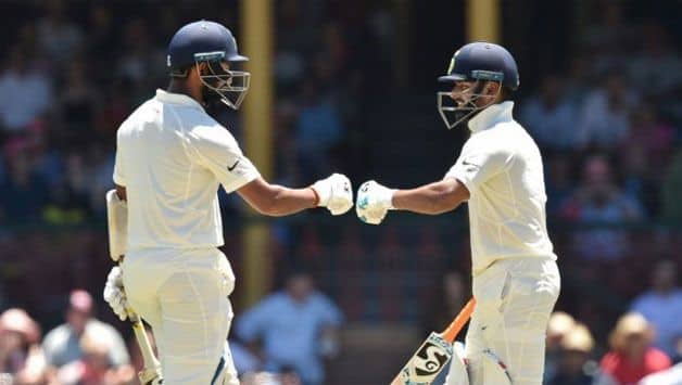 Australia flattened by Pujara, Pant tons in Sydney