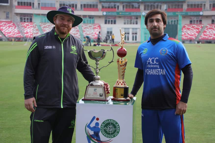 Paul Stirling and Asghar Afghan pose with the trophies.