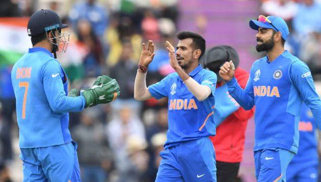 MS Dhoni yuzvendra Chahal, Virat Kohli AFP