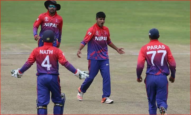 Sandeep Lamichhane with team © Getty Images