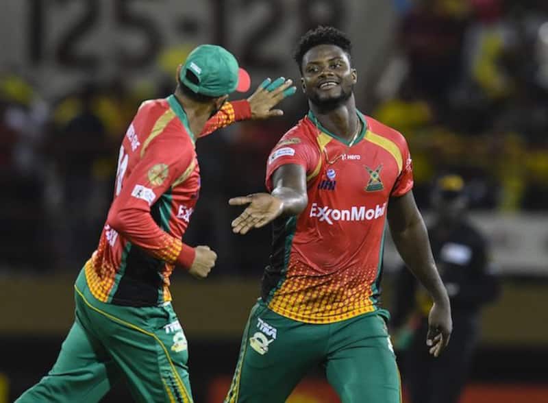 Romario Shepherd bowling