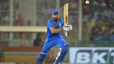 2nd T20I: Kohli guides India to empha...