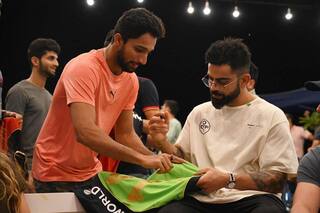 Mohammed azharuddeen gets virat kohli to sign a jersey for him shares photo 4661558