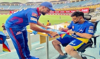 Dreams do come true ms dhoni signs lalit yadavs jersey 5026084
