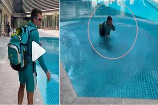 Cricket news pak vs aus 2nd test alex carey hilariously falls into swimming pool video viral 5280319