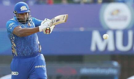Sports hindi cricket news kieron pollard s stunning six in net session cracks glass of mi team bus watch video 5315105