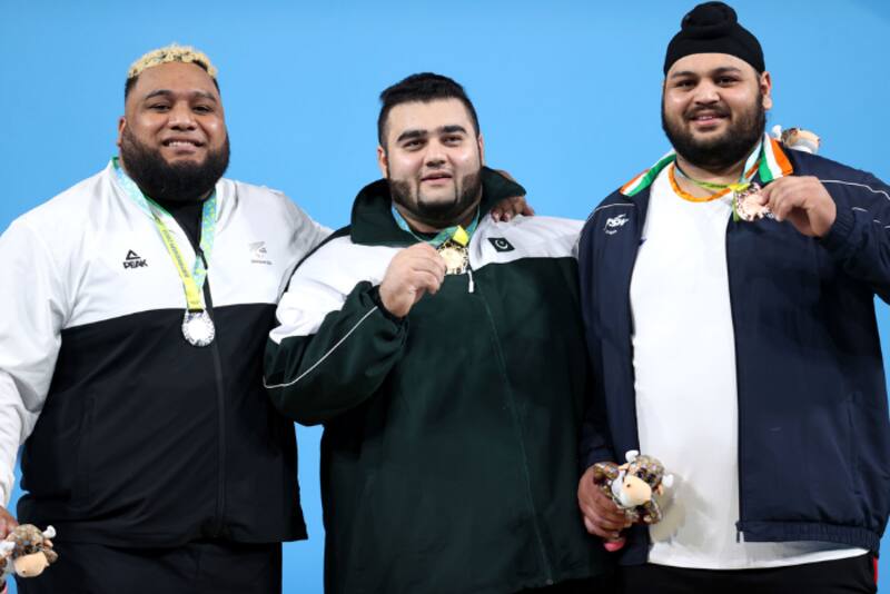 Nooh Dastagir Butt, Weightlifting, Pakistani weightlifter, Gurdeep Singh, weightlifting, Indian weightlifting medals, Pakistan medals in CWG 2022, India weightlifters, Pakistan medal tally, India medal tally, Commonwealth Games, Commonwealth Games 2022, Birmingham 2022 Commonwealth Games,Commonwealth Games Schedule,Commonwealth Games India Schedule,Commonwealth Games Schedule 2022,India Commonwealth Games 2022,CWG,India at Commonwealth Games 2022,CWG 2022 India Schedule,CWG 2022 Schedule India,CWG 2022 India,Commonwealth Games 2022 Sports,Common Wealth Games,Commonwealth Games 2022 Full Schedule,Commonwealth Games India Full Schedule,Commonwealth Games 2022 India Players Schedule, Commonwealth Games 2022,Commonwealth Games,Commonwealth Games 2022 Schedule,CWG 2022,Commonwealth Games 2022 India Schedule,Commonwealth Games 2022 India,Birmingham Commonwealth Games,CWG 2022 Schedule,Birmingham,Commonwealth Games 2022 Schedule India, Mandeep Singh Harmanpreet SIngh, Akashdeep Singh, India Hockey Team, India Hockey Team in CWG, Men’s Hockey Team schedule, Men’s Hockey Team Wins against Ghana, Commonwealth games all events, Commonwealth games all sports, P V Shindu, Shiv Thapa, Shiv thapa boxing, Shiv thapa win over Pakistan, who is shiv thapa, India Hockey women team, Harmanpreet Kaur, Shafali Verma, India Badminton win, India table tennis win, Mirabai Chanu, Mirabai Chanu Weightlifting, Manika Batra, Satwiksairaj Rankireddy, Chirag Shetty, Treesa Jolly-Gayatri Gopichand, India wins CWG 2022 sports, CWG 2022, Birmingham 2022, commonwealth games 2022, commonwealth games schedule, commonwealth games sports, commonwealth games participants, participants in CWG 2022, CWF sponsors, Shakespeare, Vintage Cars, Duran Duran, Malala Yousafzai, India in CWG 2022, India team in CWG 2022, India best players CWG 2022, India Badminton team, Indian Athletes in CWG 2022, Birmingham 2022, CWG participating countries, CWG updates, India medals in CWG, Sports News, Sports latest news, CWG News