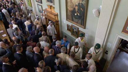 Usman Khawaja was pulled back by security after speaking to one the members inside the long room