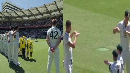 Cameron Green who tested positive for COVID 19 keeping distance with his teammates during the match