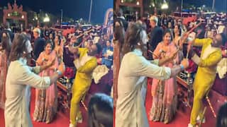 MS Dhoni Sakshi and DJ Bravo dancing and playing Dandiya at the Pre wedding of Anant Ambani