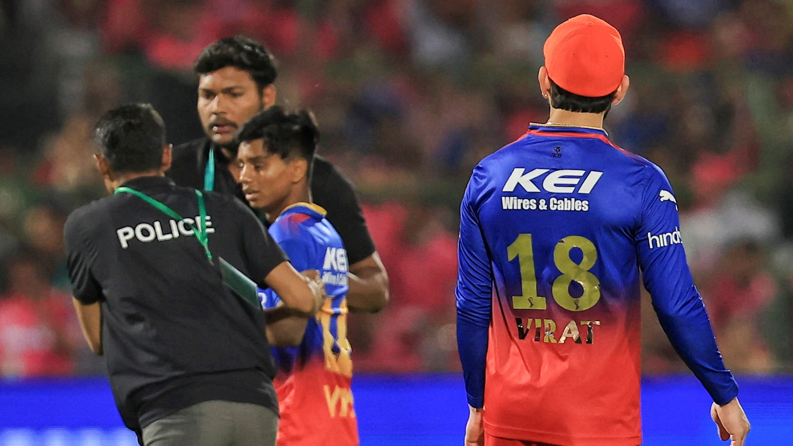 IPL 2024: Virat Kohli fans are Insane about him, Another match another Virat Kohli fan sneaks past security in Jaipur
