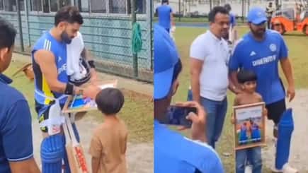 Virat Kohli and Rohit Sharma share Wholesome Moment with a Little Kid- Autograph and Photos