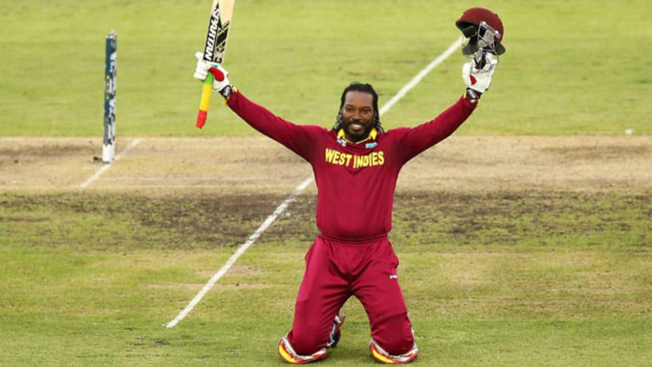 Gayle celebrating after scoring a double-ton