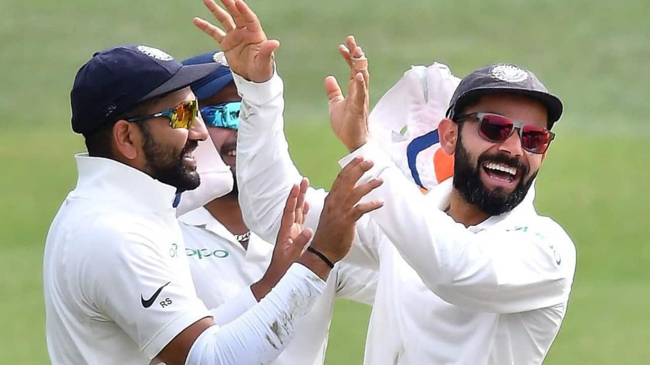 Rohit and Kohli playing a Test match for India