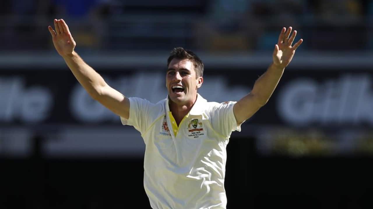 Cummins taking a Test wicket