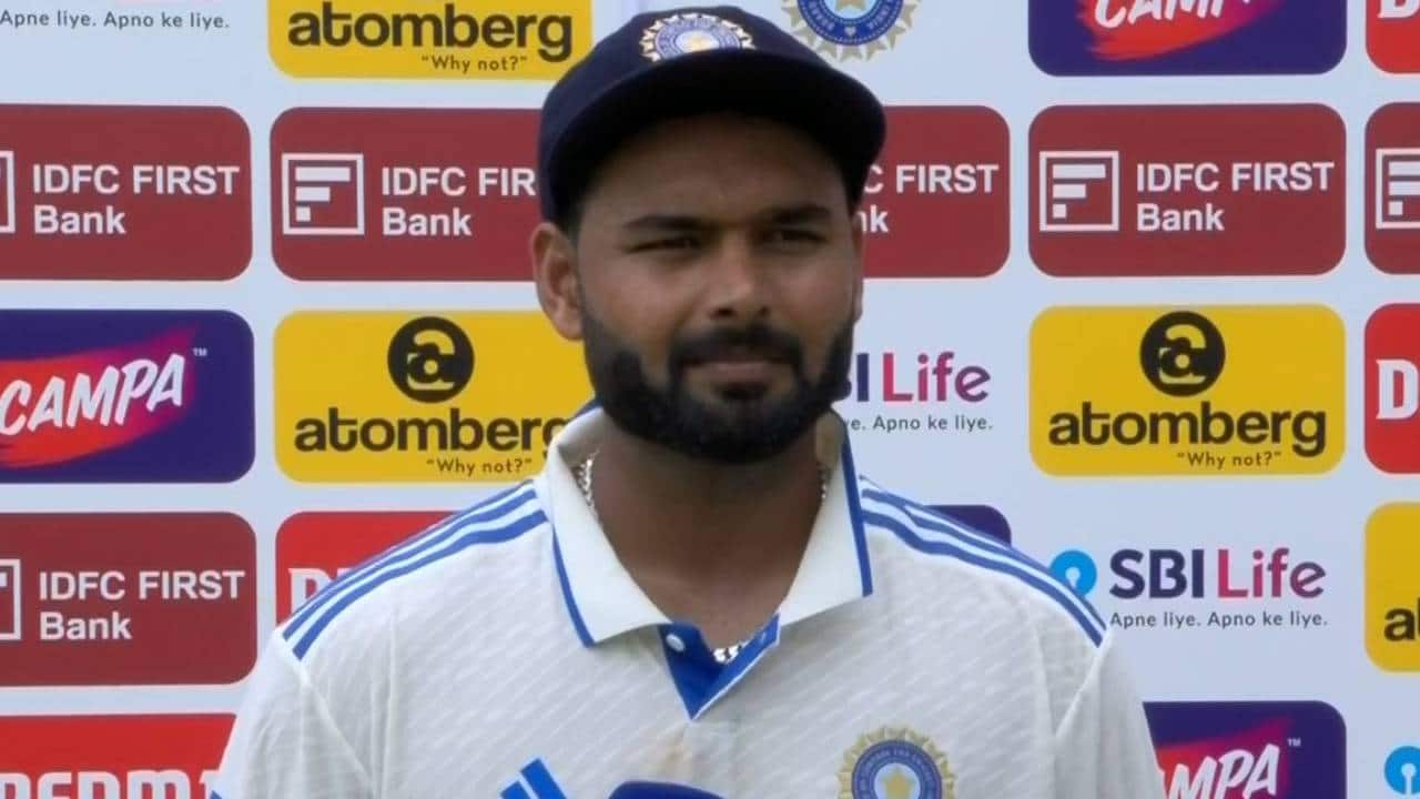 Pant speaking during the post-match presentation