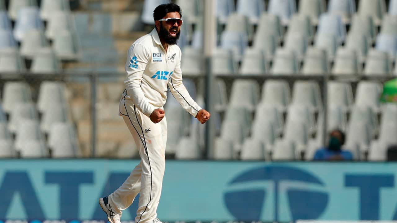 Patel taking a wicket during a Test match