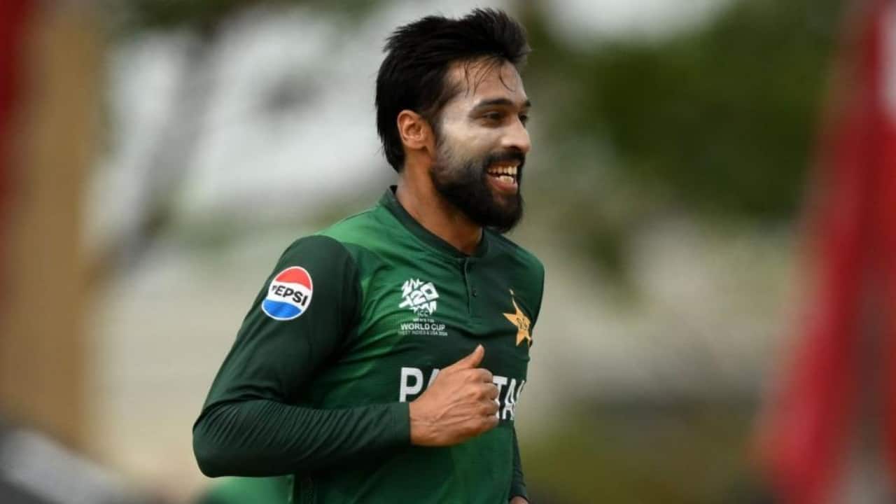 Amir bowling during a match