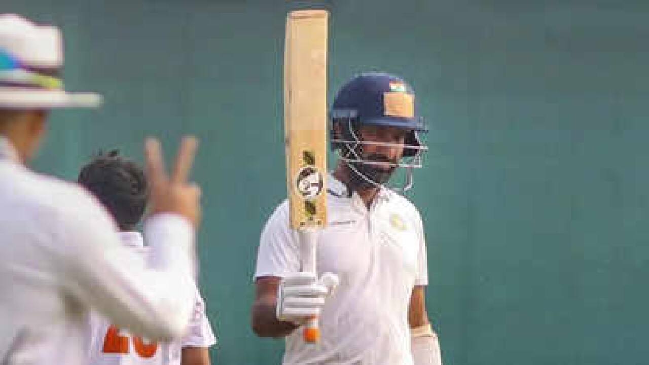 Pujara scoring a Test ton