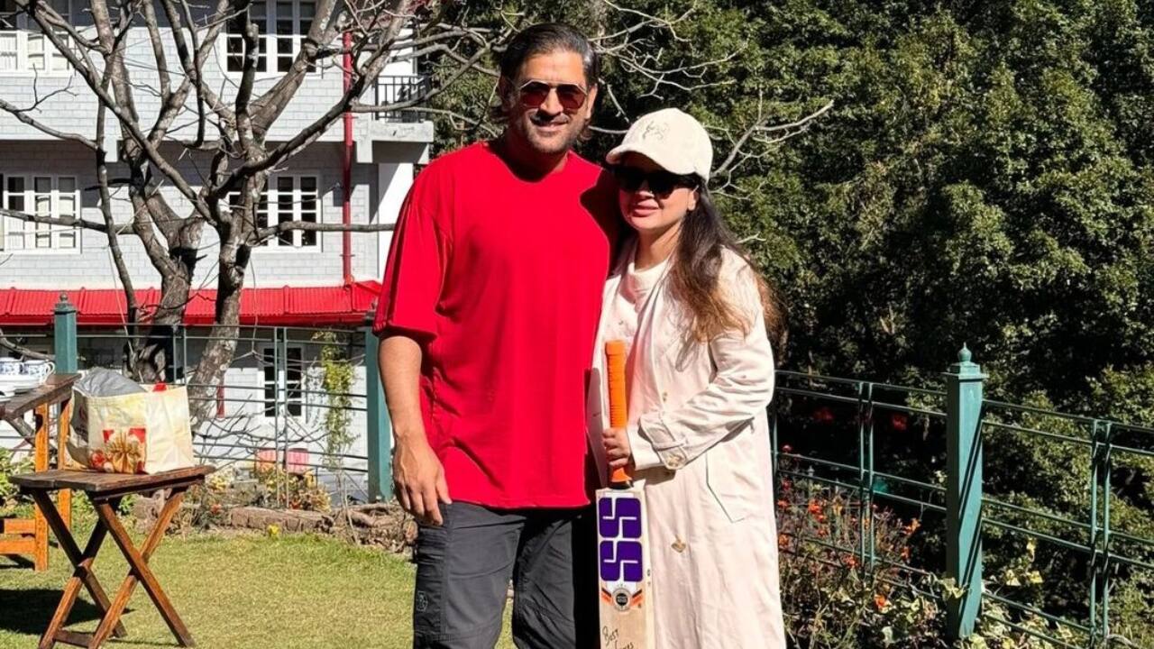 Dhoni with his wife Sakshi