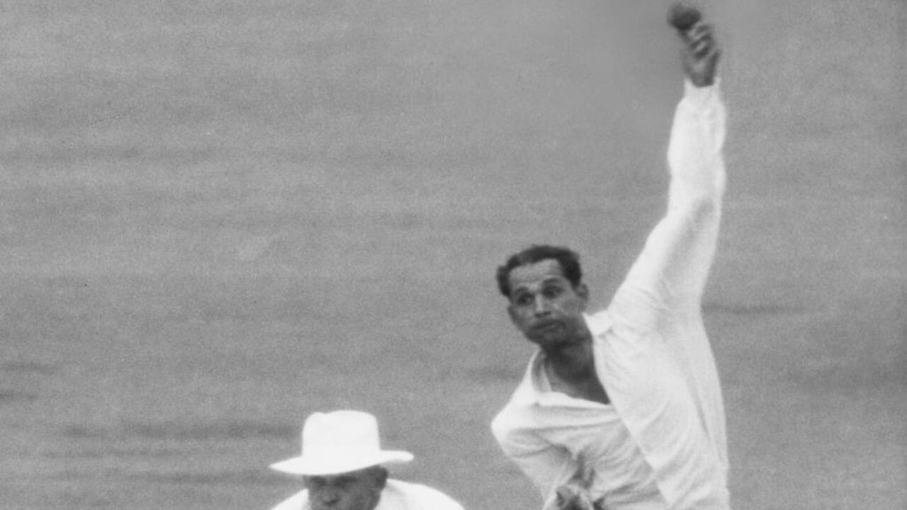 Nadkarni bowling during a Test match