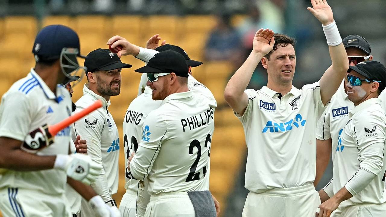 New Zealand team celebrating a wicket during a Test match