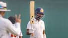 Pujara scoring a ton during a Test match