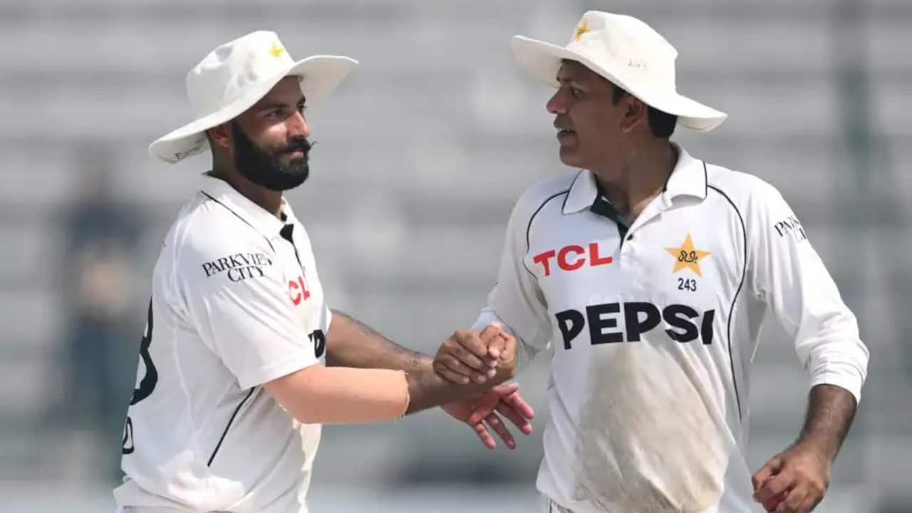 Sajid and Noman fielding during a Test match
