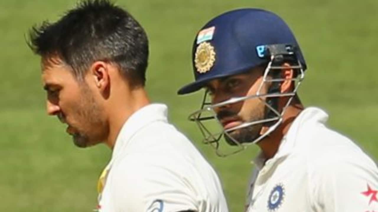 Mitchell Johnson and Virat Kohli