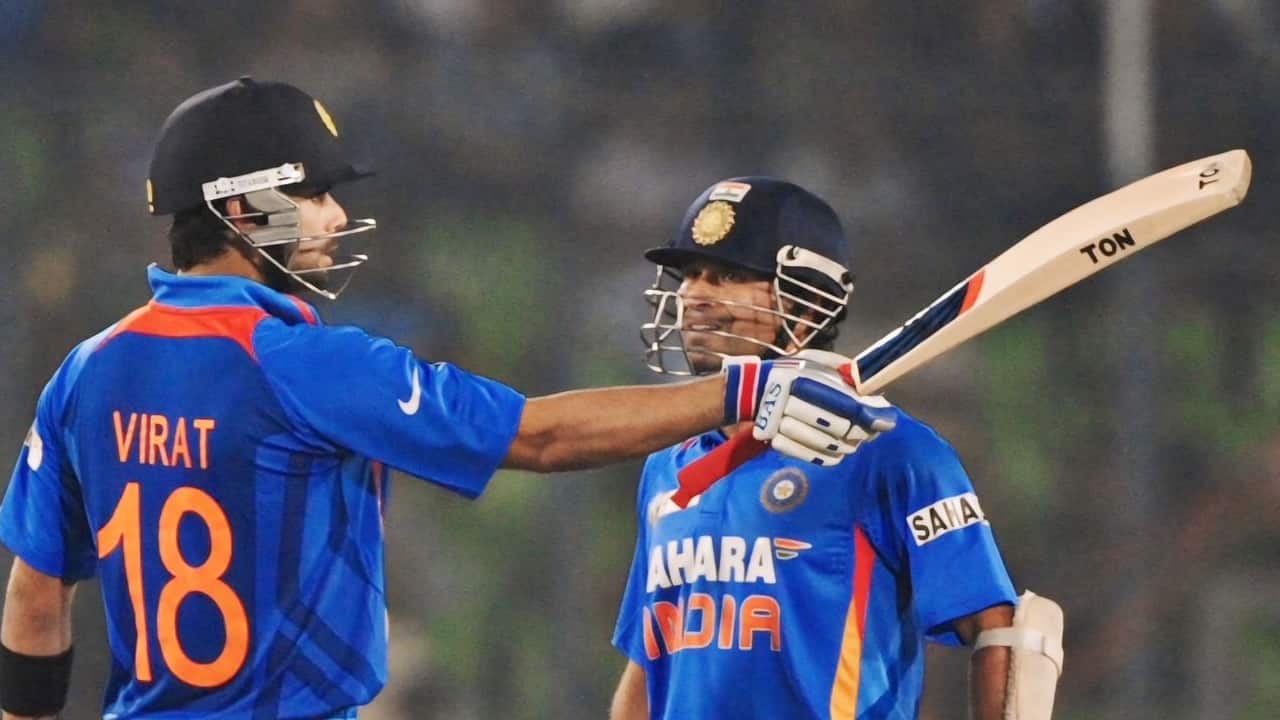 Kohli and Tendulkar batting during a match