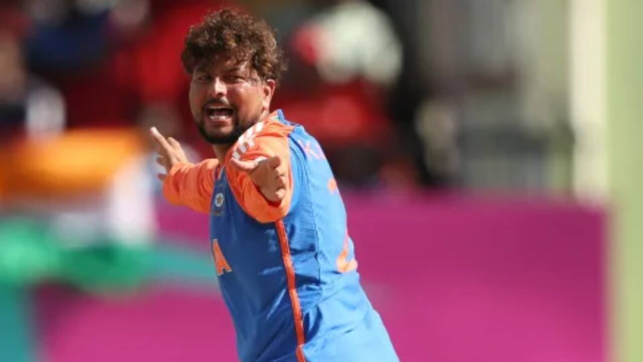 Kuldeep taking a wicket during a T20I