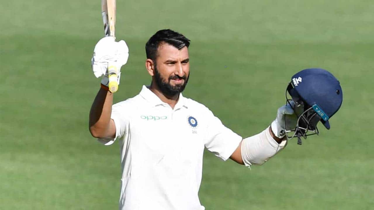 Pujara scoring a Test century
