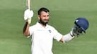 Pujara scoring a Test century