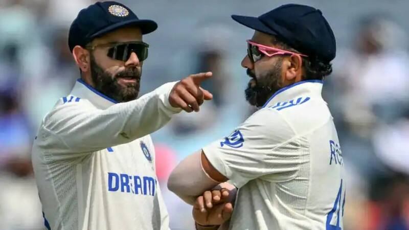 Rohit and Kohli chatting during a match Rohit and Kohli chatting during a match
