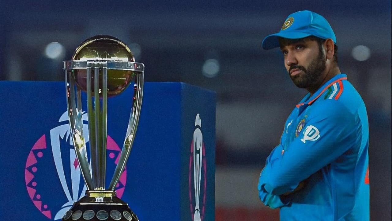 Rohit beside the 2023 World Cup trophy
