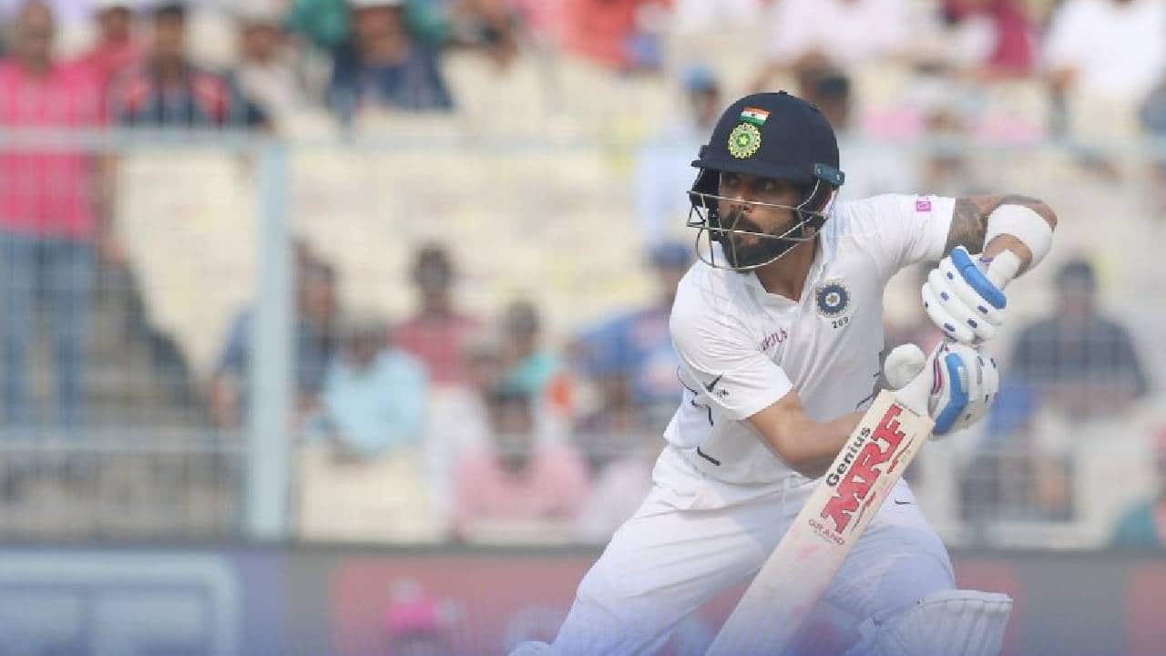 Virat Kohli runs