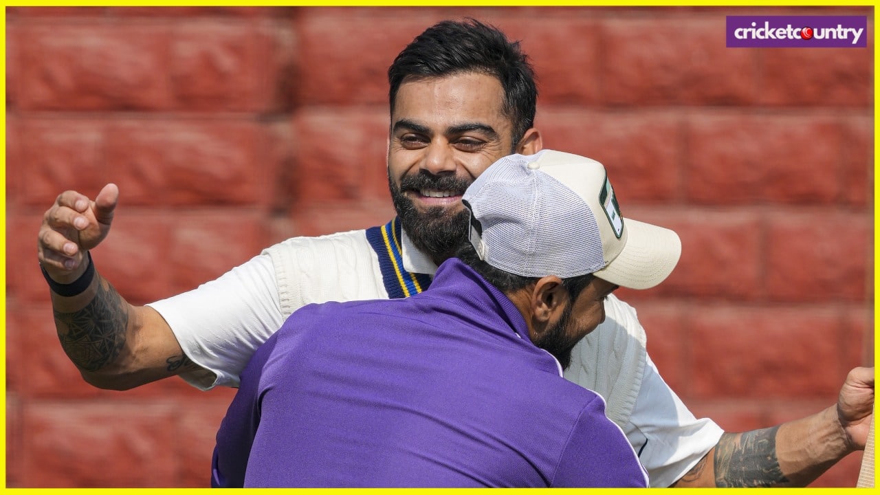 New Delhi: Delhi's player Virat Kohli shares a light moment with his former cricket mate Shavez during a training session ahead of the Ranji Trophy 2024-25 cricket match between Delhi and Railways, at the Arun Jaitley Stadium, in New Delhi, Tuesday