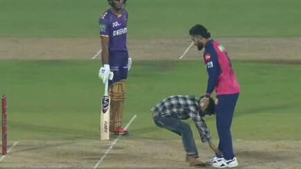 riyan parag trolled on social media after fan touched his feet during rr vs kkr match ipl 2025