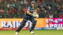 Batting Collapse by RCB and Jos Buttler’s fifty led GT to an 8-wicket victory over RCB