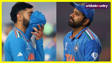 Rohit Sharma and Virat Kohli walking off the field after India’s loss to Australia in the 2023 ODI World Cup final, symbolizing heartbreak and pride.