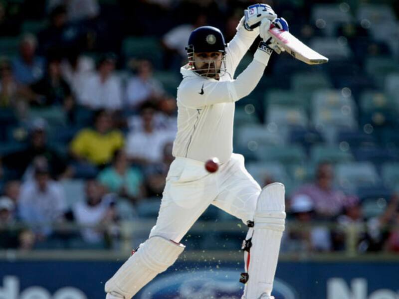 Sehwag falls early after Australia pile up runs