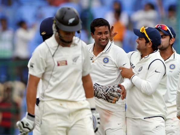 Ross Taylor puts New Zealand on top despite Pragyan Ojha's four-for on day one Ross Taylor puts New Zealand on top despite Pragyan Ojha's four-for on day one