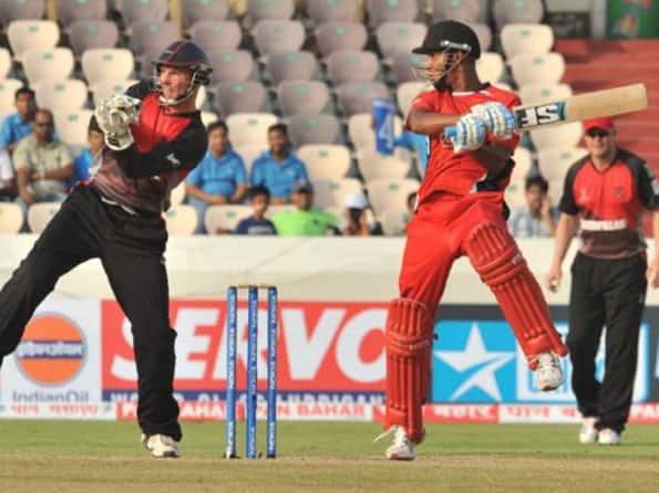 Simmons, Barath half-centuries guide T&T to 168 Simmons, Barath half-centuries guide T&T to 168