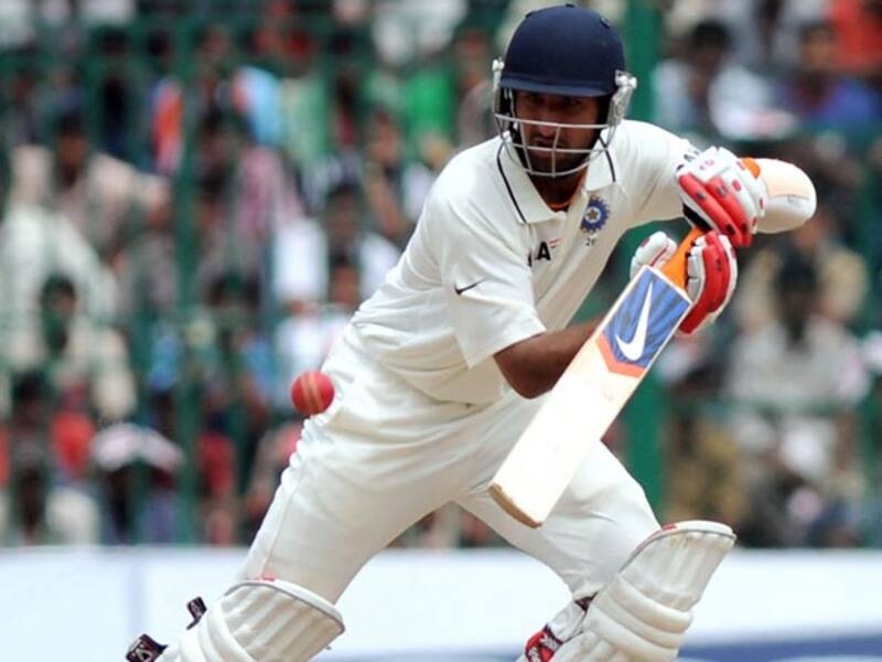 Cheteshwar Pujara's approach to game similar to Rahul Dravid: Lalchand Rajput