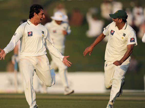 Ajmal's late strikes brings Pakistan back into the game