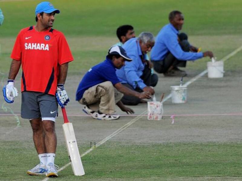 Dhoni backs under-fire bowlers