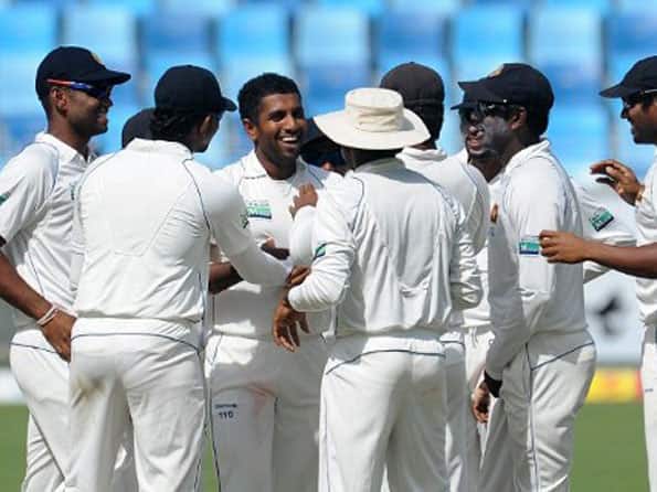Dhammika Prasad's strikes jolt Pakistan on second day Dhammika Prasad's strikes jolt Pakistan on second day
